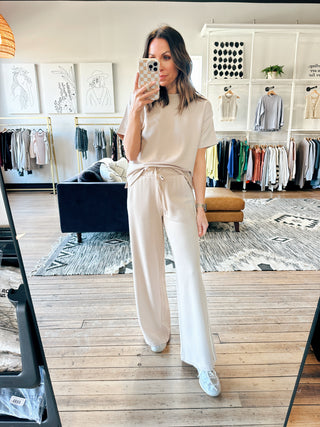 Layover Modal Track Pant - Parchment-BottomsHarper Two Piece Set-Blush | VerClare Boutique | Chenoa, IL-Women's Blush Lounge Set. Available in sizes: S, M, L. 60% Cotton, 40% Polyester. Free US shipping on all eligible orders. Located in Chenoa, Illinois.-VerClare Boutique