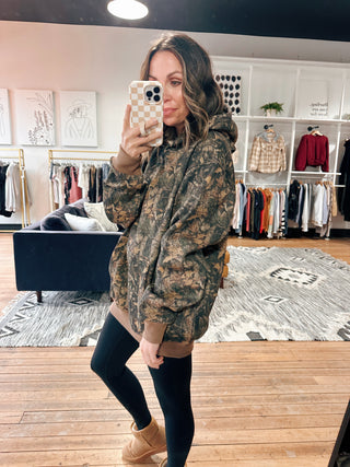Bayou Camo Fleece Hoodie-Jackets & KimonosWomen's Hoodie | VerClare Boutique-Bayou Camo Fleece Hoodie: Sizes: S - L. Color: Dark Camo. Fabric: 55% Cotton 45% Polyester. Free Shipping on $100+ orders with VerClare Boutique in Chenoa, IL. -VerClare Boutique