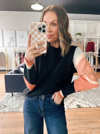 Bianca Sunrise Sweater-SweatersBianca Sunrise Sweater | VerClare Boutique | Chenoa, IL-Black sweater with sunrise-inspired colorblock sleeves in soft peach and cream tones. Cozy, cute, and perfect for everyday wear. Free US shipping from VerClare Boutique.-VerClare Boutique