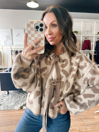 Fiona Leopard Bow Cardigan - 2 Colors-SweatersFiona Leopard Bow Cardigan – 2 Colors | VerClare Boutique-Leopard print bow-front cardigan in two neutral color options. Soft, cozy, and perfect for layering. Free US shipping from VerClare Boutique.-VerClare Boutique