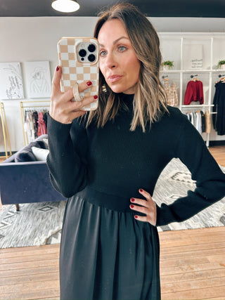 Mercer Sweater Dress-Black-Dresses & RompersMercer Black Sweater Dress for Women | VerClare Boutique | Chenoa, IL-Shop the Mercer Black Sweater Dress for women featuring a soft knit feel, flattering silhouette, and versatile midi length perfect for work, events, or everyday wear at VerClare Boutique.-VerClare Boutique