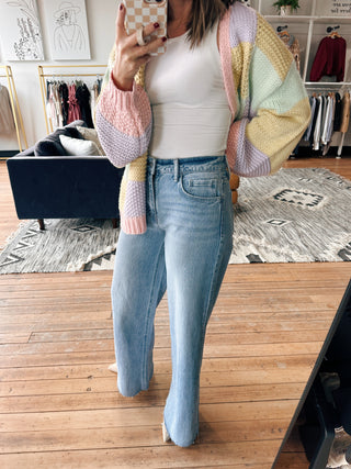 Tovia Raw Hem Wide Jeans-BottomsTovia Raw Hem Wide Leg Jeans for Women | VerClare Boutique | Chenoa, IL-Shop the Tovia Raw Hem Wide Leg Jeans at VerClare Boutique. High-rise fit with a raw hem and relaxed wide leg silhouette—perfect for everyday wear. Fast shipping available.-VerClare Boutique