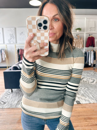 Ivana Variegated Stripe Sweater Top-Tops Basic PrintIvana Variegated Stripe Sweater Top | VerClare Boutique | Chenoa, IL-Shop the Ivana Variegated Stripe Sweater Top at VerClare Boutique. A lightweight women’s striped sweater with a flattering fit—perfect for everyday wear.-VerClare Boutique