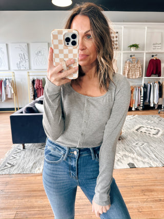 Elina Square Neck Snap Cardigan - 2 Colors-Tops Basic SolidElina Square Neck Snap Cardigan – 2 Colors | VerClare Boutique | Chenoa, IL-Shop the Elina Square Neck Snap Cardigan at VerClare Boutique. A ribbed women’s cardigan with a square neckline and snap buttons, available in two colors.-VerClare Boutique