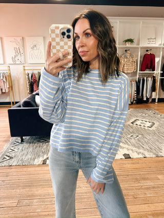 By Together-Foster Stripe Top-Tops Basic PrintBy Together Foster Stripe Top | VerClare Boutique | Chenoa, IL-By Together Foster stripe top in soft blue and cream with a relaxed, everyday fit. Lightweight, comfy, and perfect for casual layering. Free US shipping from VerClare Boutique.-VerClare Boutique