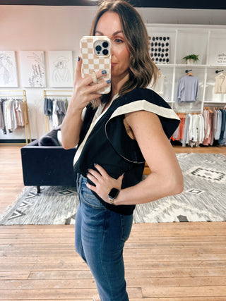 Amina Flutter Sleeve V-Neck Top - Black-Tops CasualAmina Flutter Sleeve V-Neck Top – Black | VerClare Boutique | Chenoa, IL-Chic black flutter sleeve V-neck top with a lightweight, flowy feel. Easy to dress up or down for everyday wear. Shop women’s boutique styles at VerClare Boutique.-VerClare Boutique