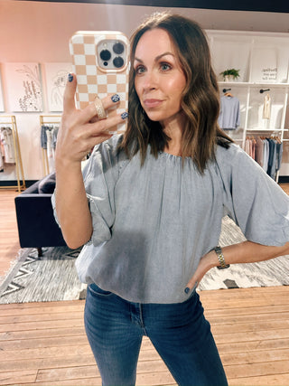 Vienne Flowy Top - Denim Blue-Tops CasualVienne Flowy Top – Denim Blue | VerClare Boutique | Chenoa, IL-Shop the Vienne Flowy Top in denim blue at VerClare Boutique. A soft, lightweight top with a relaxed silhouette that’s perfect for everyday wear and effortless styling.-VerClare Boutique