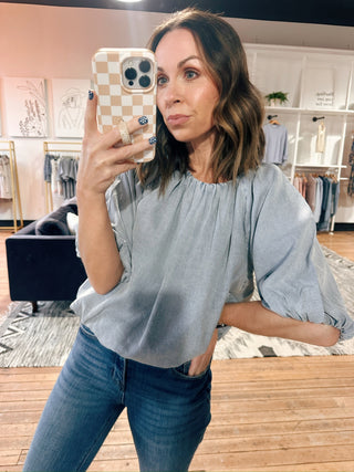 Vienne Flowy Top - Denim Blue-Tops CasualVienne Flowy Top – Denim Blue | VerClare Boutique | Chenoa, IL-Shop the Vienne Flowy Top in denim blue at VerClare Boutique. A soft, lightweight top with a relaxed silhouette that’s perfect for everyday wear and effortless styling.-VerClare Boutique