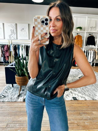 Snap! Vegan Leather Vest-Jackets & KimonosSnap! Vegan Leather Vest | VerClare Boutique | Chenoa, IL-Women's Front Button Vest | Snap! Vegan Leather Vest | Sizes: S, M, L | Color: Black | Free US shipping on all eligible orders. Located in Chenoa, Illinois-VerClare Boutique