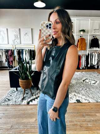 Snap! Vegan Leather Vest-Jackets & KimonosSnap! Vegan Leather Vest | VerClare Boutique | Chenoa, IL-Women's Front Button Vest | Snap! Vegan Leather Vest | Sizes: S, M, L | Color: Black | Free US shipping on all eligible orders. Located in Chenoa, Illinois-VerClare Boutique