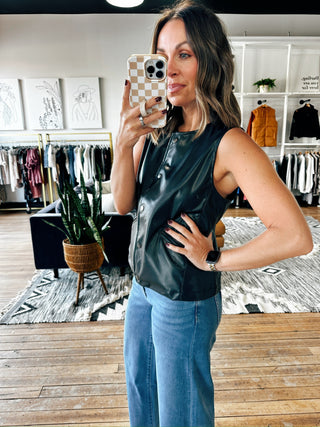 Snap! Vegan Leather Vest-Jackets & KimonosSnap! Vegan Leather Vest | VerClare Boutique | Chenoa, IL-Women's Front Button Vest | Snap! Vegan Leather Vest | Sizes: S, M, L | Color: Black | Free US shipping on all eligible orders. Located in Chenoa, Illinois-VerClare Boutique