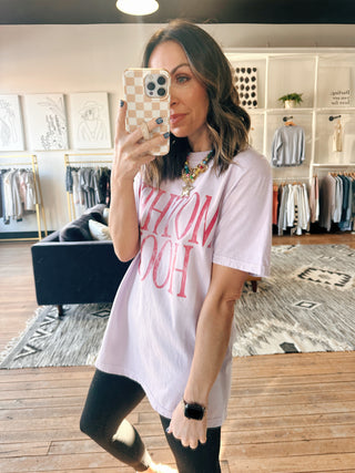 Motherhood Graphic Tee - Lilac/Pink-Tops Basic PrintMotherhood Graphic Tee – Lilac/Pink | VerClare Boutique | Chenoa, IL-Shop the Motherhood Graphic Tee in lilac and pink at VerClare Boutique. A soft, feel-good graphic tee that’s easy to style for everyday wear.-VerClare Boutique