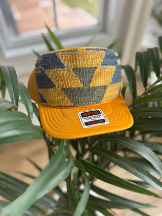 Orijinal Designs Trucker Cap-Gold with Blue Detail-AccessoriesOrijinal Designs Trucker Cap-Black | VerClare Boutique | Chenoa, IL-Trucker Hat. Wear with care! Structured Bill. Final sale. Free US shipping on all eligible orders. Shop Pay Accepted. Located in Chenoa, Illinois.-VerClare Boutique