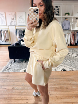 Nina Soft-Touch Pullover Set - Lemon-Jackets & KimonosNina Soft-Touch Pullover Set – Lemon | VerClare Boutique | Chenoa, IL-Cozy meets cute with the Nina Soft-Touch Pullover Set in Lemon. Ultra-soft fabric with a relaxed pullover and drawstring shorts—perfect for lounging, errands, or casual days. Shop now at VerClare Boutique.-VerClare Boutique