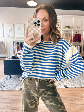 Melanie Striped Knit Sweater-SweatersMelanie Striped Knit Sweater | VerClare Boutique | Chenoa, IL-Blue and cream striped contrast sweater with a soft, relaxed fit. Effortless, coastal-inspired style for everyday wear. Free US shipping from VerClare Boutique. | Sizes: S, M, L | Color: Pacific | Free US shipping on all eligible orders. Located in Chenoa, Illinois-VerClare Boutique