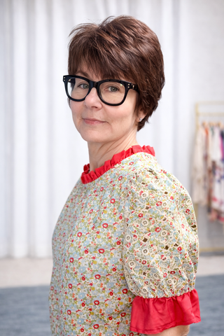 Gemma Contrast Ruffle Floral Embroidered Top-Tops CasualGemma Contrast ruffle Floral Embroidered Top | VerClare Boutique | Jenison MI-This is a beautiful floral print, round neckline, eyelet embroidered short puff sleeve, contrast colored solid ruffle detail, back neck button and loop closure and a striped elastic banded hem. Free US shipping from VerClare Boutique on eligible orders.-VerClare Boutique