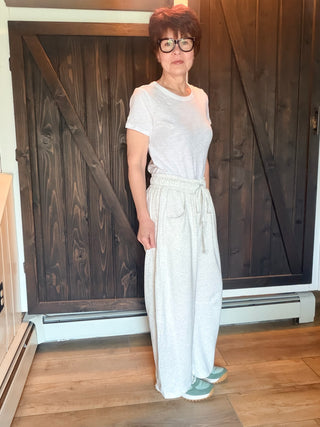 Jessie Cotton French Terry Barrel Leg Pants - Cloud Mist-BottomsJessie Barrel Leg Pants - Cloud Mist | VerClare Boutique-Shop the Jessie Cotton French Terry Barrel Leg Pants in Cloud Mist. Baggy barrel leg, elastic drawstring waist, front pockets, 85% cotton. Sizes S–L.-VerClare Boutique