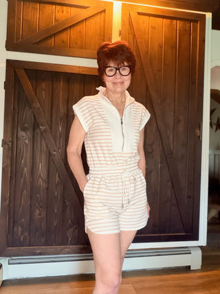 Danica Striped Zip Front Romper - Light Khaki-Dresses & RompersThe Workshop Danica Striped Zip Front Romper - Light Khaki | VerClare Boutique-Shop The Workshop Danica Striped Zip Front Romper in Light Khaki. Stretch knit, mock neck, front zip, drawstring waist, short sleeve. Sizes S–L.-VerClare Boutique