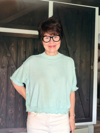 Carlisle Lightweight Knit Mock Neck Short Sleeve Sweater-SweatersCarlisle Knit Mock Neck Short Sleeve Sweater in Ash Mint | VerClare Boutique-Shop the &merci Carlisle lightweight knit mock neck sweater in Ash Mint — short sleeves, rolled hem, relaxed fit. Sizes S–L. $53.99 at VerClare Boutique.-VerClare Boutique