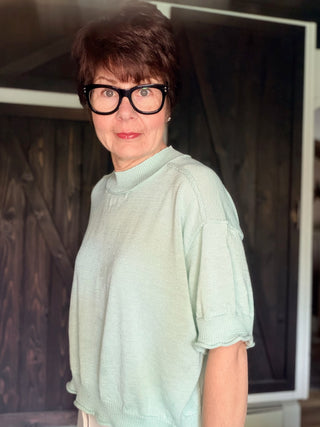 Carlisle Lightweight Knit Mock Neck Short Sleeve Sweater-SweatersCarlisle Knit Mock Neck Short Sleeve Sweater in Ash Mint | VerClare Boutique-Shop the &merci Carlisle lightweight knit mock neck sweater in Ash Mint — short sleeves, rolled hem, relaxed fit. Sizes S–L. $53.99 at VerClare Boutique.-VerClare Boutique