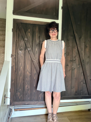 Shellie Ruffled Rib Band Dress-Dresses & RompersShellie Ruffled Rib Band Dress – Slater Blue | Voy – VerClare Boutique-Shop the Voy Shellie Ruffled Rib Band Dress in Slater Blue. 60% cotton 40% polyester, round neck, sleeveless, pockets, ruffle band, flared skirt, true to size. Sizes S–L.-VerClare Boutique