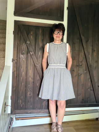 Shellie Ruffled Rib Band Dress-Dresses & RompersShellie Ruffled Rib Band Dress – Slater Blue | Voy – VerClare Boutique-Shop the Voy Shellie Ruffled Rib Band Dress in Slater Blue. 60% cotton 40% polyester, round neck, sleeveless, pockets, ruffle band, flared skirt, true to size. Sizes S–L.-VerClare Boutique