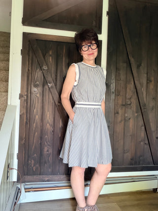 Shellie Ruffled Rib Band Dress-Dresses & RompersShellie Ruffled Rib Band Dress – Slater Blue | Voy – VerClare Boutique-Shop the Voy Shellie Ruffled Rib Band Dress in Slater Blue. 60% cotton 40% polyester, round neck, sleeveless, pockets, ruffle band, flared skirt, true to size. Sizes S–L.-VerClare Boutique