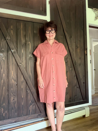Trudy Utility-Inspired Mini Dress-Dresses & RompersRose Meadow Utility Mini Dress – Airy Cotton Style | VerClare Boutique-Shop the Transitional Utility-Inspired Airy Mini Dress in Rose Meadow. Button-down front, pockets, relaxed fit — effortless everyday style.-VerClare Boutique