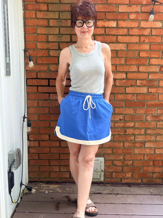 Rylan Knit Mini Skirt - Cobalt Blue-BottomsSHE + SKY Rylan Knit Mini Skirt - Cobalt Blue | VerClare Boutique-Shop the SHE + SKY Rylan Knit Mini Skirt in Cobalt Blue. Soft stretch knit, contrast hem, elastic waist, functional pockets, mini length. Sizes S–L.-VerClare Boutique