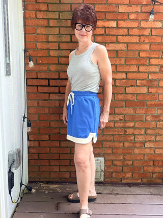 Rylan Knit Mini Skirt - Cobalt Blue-BottomsSHE + SKY Rylan Knit Mini Skirt - Cobalt Blue | VerClare Boutique-Shop the SHE + SKY Rylan Knit Mini Skirt in Cobalt Blue. Soft stretch knit, contrast hem, elastic waist, functional pockets, mini length. Sizes S–L.-VerClare Boutique