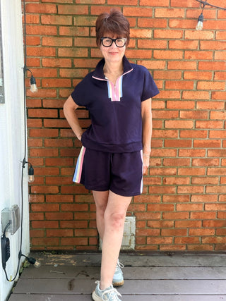 Novah Color Band Top & Shorts Sets - Navy-Tops CasualJODIFL Novah Color Band Top & Shorts Set - Navy | VerClare Boutique-Shop the JODIFL Novah Color Band Top & Shorts Set in Navy. Rayon-blend stretch knit, zip-up drop shoulder top, drawstring shorts, sporty matching set. Sizes S–L.-VerClare Boutique
