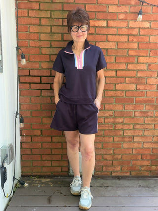 Novah Color Band Top & Shorts Sets - Navy-Tops CasualJODIFL Novah Color Band Top & Shorts Set - Navy | VerClare Boutique-Shop the JODIFL Novah Color Band Top & Shorts Set in Navy. Rayon-blend stretch knit, zip-up drop shoulder top, drawstring shorts, sporty matching set. Sizes S–L.-VerClare Boutique