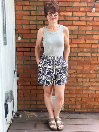 Zarina Tropical Print Shorts - Navy/Ivory-BottomsSkies Are Blue Zarina Tropical Print Shorts - Navy/Ivory | VerClare Boutique-Shop the Skies Are Blue Zarina Tropical Print Shorts in Navy/Ivory. Viscose woven, tropical print, relaxed summer silhouette, mid-rise. Sizes XS–L.-VerClare Boutique