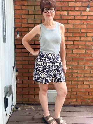 Zarina Tropical Print Shorts - Navy/Ivory-BottomsSkies Are Blue Zarina Tropical Print Shorts - Navy/Ivory | VerClare Boutique-Shop the Skies Are Blue Zarina Tropical Print Shorts in Navy/Ivory. Viscose woven, tropical print, relaxed summer silhouette, mid-rise. Sizes XS–L.-VerClare Boutique