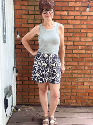 Zarina Tropical Print Shorts - Navy/Ivory-BottomsSkies Are Blue Zarina Tropical Print Shorts - Navy/Ivory | VerClare Boutique-Shop the Skies Are Blue Zarina Tropical Print Shorts in Navy/Ivory. Viscose woven, tropical print, relaxed summer silhouette, mid-rise. Sizes XS–L.-VerClare Boutique