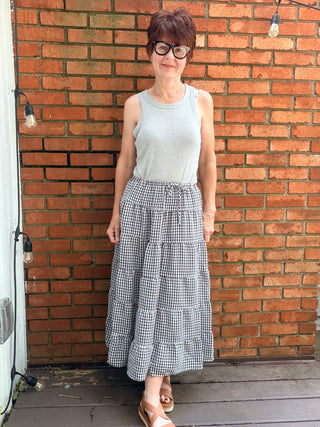 Zaria Gingham Tiered Maxi Skirt-BottomsRaisonnel Zaria Gingham Tiered Maxi Skirt | VerClare Boutique-Shop the Raisonnel Zaria Gingham Tiered Maxi Skirt. Lightweight woven, gingham check, multi-tiered puff design, elastic waist, fully lined. Sizes S–L.-VerClare Boutique