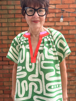 Tiana Pattern V-Neck Top - Green-Tops CasualTiana Pattern V-Neck Top – Green | THML – VerClare Boutique-Shop the THML Tiana Pattern V-Neck Top in Green. Rayon-nylon woven, V-neck, short sleeves, flowy patterned silhouette, true-to-size fit. Sizes XS–L.-VerClare Boutique