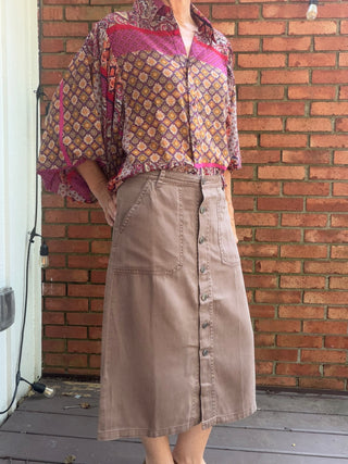 Pyrah Tencel Button Skirt - 3 Colors-BottomsPyrah Tencel Button Skirt | Cocoa, Charcoal & Mauve – Be Cool | VerClare Boutique-Shop the Be Cool Pyrah Tencel Button Skirt — garment-washed Tencel blend, paneled silhouette, true to size. Cocoa, Dark Charcoal & Mauve. Sizes S–L.-VerClare Boutique