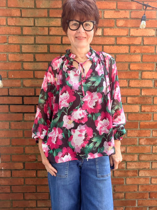 Vivian High Neckline Blouse-Tops CasualVivian High Neckline Blouse | Black Multi Floral Balloon Sleeve – Fate by LFD | VerClare Boutique-Shop the Fate by LFD Vivian High Neckline Blouse in Black Multi — flowy balloon sleeves, V-neck with optional tie, true to size. Sizes S–L. Ships fast.-VerClare Boutique