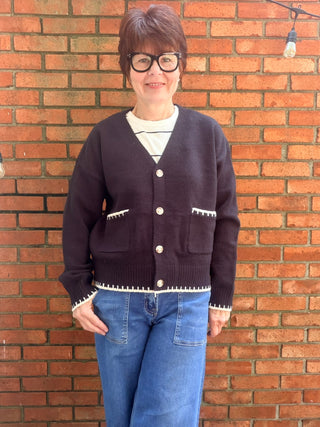 Skylar Cardigan-SweatersSkylar Cardigan | Black Whipstitch Button-Front Knit – EE:Some | VerClare Boutique-Shop the EE:Some Skylar Cardigan in black — ivory whipstitch trim, button-front, front pockets, relaxed fit. Sizes S–L. Ships fast from VerClare Boutique.-VerClare Boutique