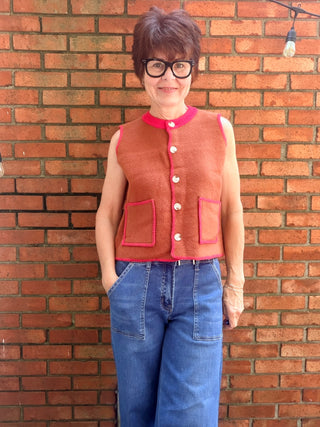 Monroe Sweater Vest-SweatersMonroe Button-Front Sweater Vest | Burnt Orange Knit – Entro | VerClare Boutique-Shop the Entro Monroe Sweater Vest in burnt orange with red trim. Button-front, pockets, sleeveless knit. Sizes S–L. Ships fast from VerClare Boutique.-VerClare Boutique
