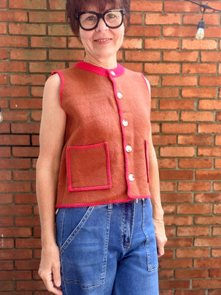 Monroe Sweater Vest-SweatersMonroe Button-Front Sweater Vest | Burnt Orange Knit – Entro | VerClare Boutique-Shop the Entro Monroe Sweater Vest in burnt orange with red trim. Button-front, pockets, sleeveless knit. Sizes S–L. Ships fast from VerClare Boutique.-VerClare Boutique