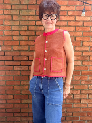 Monroe Sweater Vest-SweatersMonroe Button-Front Sweater Vest | Burnt Orange Knit – Entro | VerClare Boutique-Shop the Entro Monroe Sweater Vest in burnt orange with red trim. Button-front, pockets, sleeveless knit. Sizes S–L. Ships fast from VerClare Boutique.-VerClare Boutique