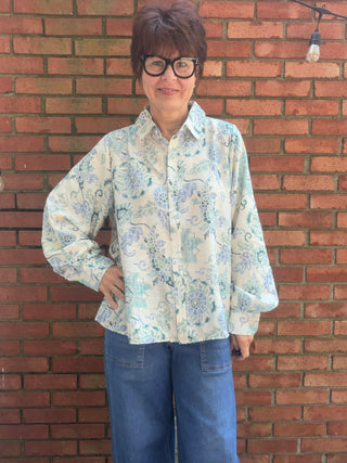 Whitney Cornflower Blouse - Blue-Tops CasualWhitney Cornflower Blouse | Blue Floral Woven Top – Entro | VerClare Boutique-Shop the Entro Whitney Cornflower Blouse in blue — a lightweight floral woven top with button-down front & collared neckline. True to size. Sizes S–L.-VerClare Boutique