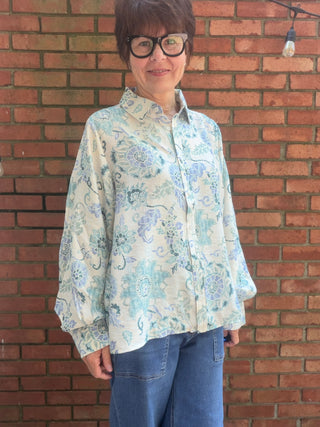 Whitney Cornflower Blouse - Blue-Tops CasualWhitney Cornflower Blouse | Blue Floral Woven Top – Entro | VerClare Boutique-Shop the Entro Whitney Cornflower Blouse in blue — a lightweight floral woven top with button-down front & collared neckline. True to size. Sizes S–L.-VerClare Boutique