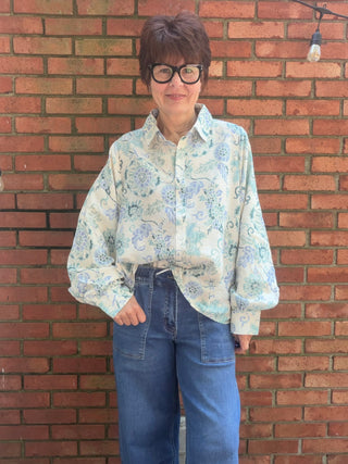 Whitney Cornflower Blouse - Blue-Tops CasualWhitney Cornflower Blouse | Blue Floral Woven Top – Entro | VerClare Boutique-Shop the Entro Whitney Cornflower Blouse in blue — a lightweight floral woven top with button-down front & collared neckline. True to size. Sizes S–L.-VerClare Boutique