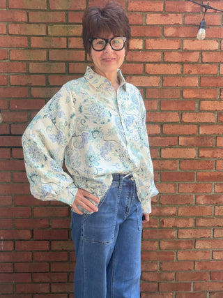 Whitney Cornflower Blouse - Blue-Tops CasualWhitney Cornflower Blouse | Blue Floral Woven Top – Entro | VerClare Boutique-Shop the Entro Whitney Cornflower Blouse in blue — a lightweight floral woven top with button-down front & collared neckline. True to size. Sizes S–L.-VerClare Boutique