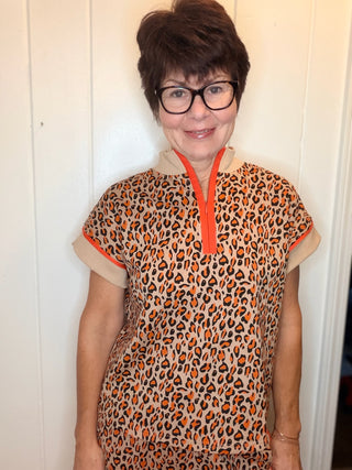 Lee Animal Print Set-SetsLeopard Print Quarter-Zip Set | VerClare Boutique-Shop the Lee leopard print set with a quarter-zip top and elastic-waist pants with side pockets. Cotton blend available in sizes S, M, and L.-VerClare Boutique