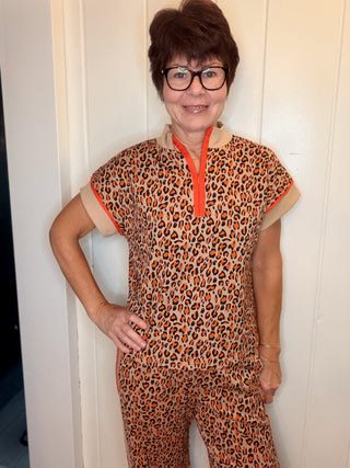Lee Animal Print Set-SetsLeopard Print Quarter-Zip Set | VerClare Boutique-Shop the Lee leopard print set with a quarter-zip top and elastic-waist pants with side pockets. Cotton blend available in sizes S, M, and L.-VerClare Boutique