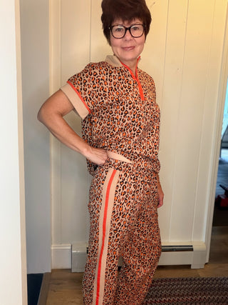 Lee Animal Print Set-SetsLeopard Print Quarter-Zip Set | VerClare Boutique-Shop the Lee leopard print set with a quarter-zip top and elastic-waist pants with side pockets. Cotton blend available in sizes S, M, and L.-VerClare Boutique